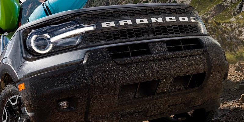 Ford Bronco SUV front grille and off-road design detail.